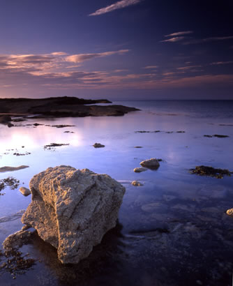Gullane rocks bathed in fading light