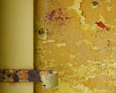 Peeling yellow paint